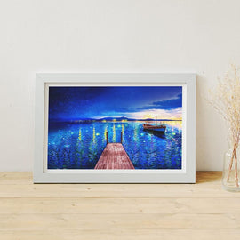 A vibrant jigsaw puzzle featuring a picturesque scene of a wooden pier extending over tranquil blue waters, under a night sky filled with stars. A small boat is moored beside the pier, with softly glowing lights reflecting off the water's surface. This beautiful piece captures the essence of a serene evening at Starry Night Port, ideal for puzzle enthusiasts.