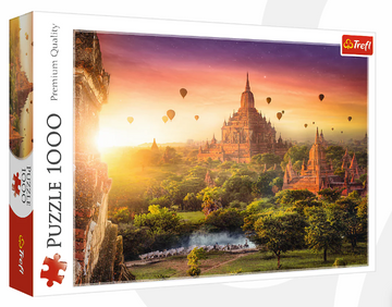 Trefl jigsaw puzzle featuring a stunning sunset view of ancient temples in Burma, surrounded by lush greenery and hot air balloons, designed for puzzle enthusiasts.