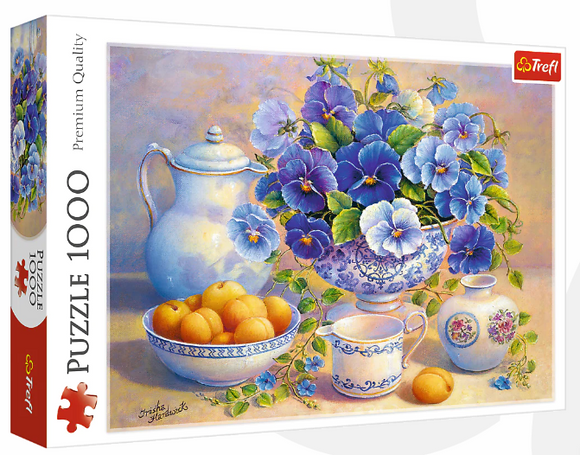 The Blue Bouquet jigsaw puzzle by Trefl features a beautiful arrangement of blue pansies in an ornate vase alongside peaches in a bowl, a ceramic teapot, and decorative cups, showcasing vibrant colors and intricate details, perfect for puzzle enthusiasts.
