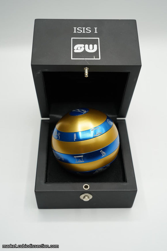 Isis Extreme Orb in blue and gold color, housed in a sleek black box. The orb features intricate designs and is meant as a mechanical puzzle for enthusiasts. Ideal for brain training and enhancing problem-solving skills.