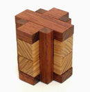 Ice Pillar by Pelikan Puzzles is a beautifully crafted mechanical puzzle made from various types of wood. It features intricately designed blocks that challenge the user to manipulate and solve the puzzle. The piece showcases a combination of warm and light wooden colors, providing a visually appealing and tactile experience. Perfect for puzzle enthusiasts and collectors alike.