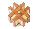 A close-up view of the Rota # mechanical puzzle by Pelikan Puzzles, featuring interlocking wooden pieces crafted from rich brown and light-colored wood. The puzzle showcases a complex, woven design that presents a challenge to solvers, making it a striking decorative piece as well as an engaging brainteaser.