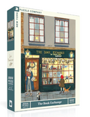 The Book Exchange jigsaw puzzle by New York Puzzle Company features a charming bookstore scene with a woman and child outside, browsing through the window filled with books. The store facade is detailed, showcasing warm lighting and a cozy atmosphere, perfect for puzzle lovers and book enthusiasts alike. This 1000-piece jigsaw puzzle provides a delightful challenge for adults and families.