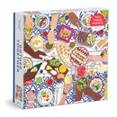The Gather Together jigsaw puzzle by Galison features a vibrant illustration of a table filled with delicious dishes and diverse hands reaching for food. This 500-piece puzzle captures the joy of sharing meals with friends and family, adorned with intricate details of various foods on colorful plates against a beautifully patterned tablecloth.
