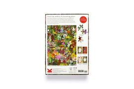 A colorful jigsaw puzzle titled 'Around the World in 50 Plants' by Laurence King Publishing. The image showcases a vibrant scene featuring various plants and flowers, with intricate illustrations that invite the viewer to explore different flora from around the globe. The back of the puzzle box highlights fun facts about each plant and the overall theme of botanical exploration.