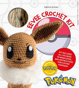 Pokemon Crochet Kit featuring Eevee. The kit includes all necessary materials and instructions to create a crochet Eevee and five other Pokémon. The image shows a close-up of the crocheted Eevee with large expressive eyes, fluffy tail, and distinct ears, set against a colorful background featuring a Pokeball graphic.