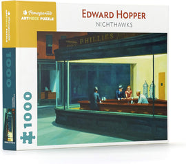 Pomegranate jigsaw puzzle depicting Edward Hopper's famous painting 'Nighthawks'. The image features a diner scene at night with four figures inside, showcasing vibrant colors and rich details. The puzzle box displays '1000 pieces', indicating the complexity and challenge of the puzzle.