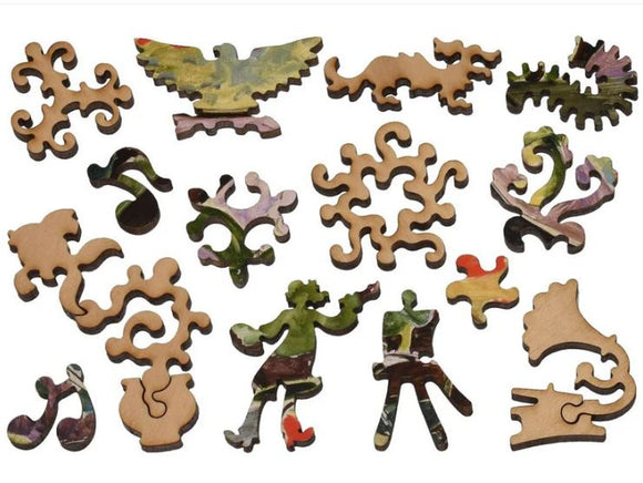 A colorful assortment of jigsaw puzzle pieces inspired by Matisse's 'Goldfish'. The pieces feature artistic shapes, including abstract designs, animals, and figures, all intricately cut from wood, showcasing a vibrant mix of colors and patterns.