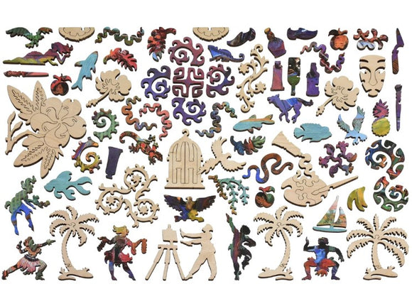 A colorful assortment of intricately shaped wooden jigsaw puzzle pieces themed around Gauguin's Studio. The pieces include figures of artists, tropical plants, and various artistic motifs, showcasing a rich palette of colors and creative designs.