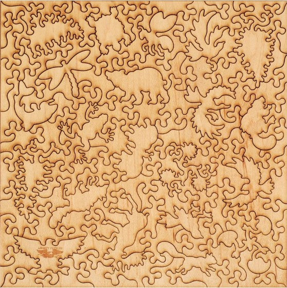 A wooden jigsaw puzzle titled 'Baby Steps' made by Liberty Puzzles. The puzzle features intricate cut-out shapes of animals, leaves, and natural elements, showcasing a smooth natural wood finish. Ideal for puzzle enthusiasts and families seeking a fun, engaging activity.