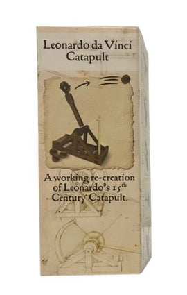 The Mini Catapult DIY kit by Pathfinders, featuring an illustrated design on the box showcasing a working re-creation of Leonardo da Vinci's 15th-century catapult. The box includes instructions for assembly and highlights the intricate mechanics behind this historical engineering marvel, perfect for crafting enthusiasts and history buffs alike.