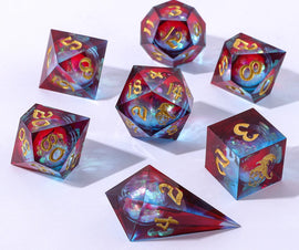 A vibrant set of Elemental Mana Liquid Core Sharp Edge RPG Dice by Hymgho. The dice feature a captivating blend of translucent red and blue colors with golden numbers. Each die comes in various shapes, including dodecahedron, tetrahedron, and cube, showcasing stunning inner liquid cores that shimmer in light, making them perfect for tabletop gaming enthusiasts.
