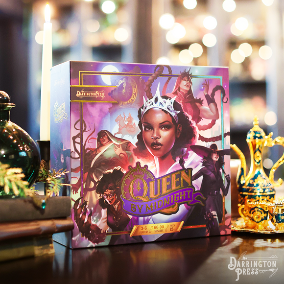 The game 'Queen By Midnight' by Darrington Press features an intricately designed box depicting diverse characters in a mystical setting. The vibrant artwork includes a queen with a crown, flanked by other characters showcasing various magical elements, all set against a backdrop of otherworldly colors. The box specifies play options for 3-6 players, with a game duration of 60-90 minutes, suitable for ages 12 and up.