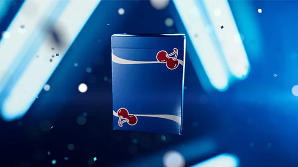 Cherry Casino Tahoe Blue Playing Cards in a sleek blue box adorned with cherry graphics, set against a blurred blue background with sparkles, ideal for card games and collectors.