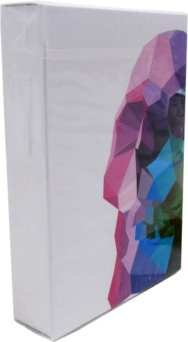 A box of Memento Mori Playing Cards by Murphy's Magic, showcasing a vibrant and colorful geometric design featuring a skull motif, symbolizing the theme of mortality and reflection. The box is neatly packaged, emphasizing its quality and aesthetic appeal.