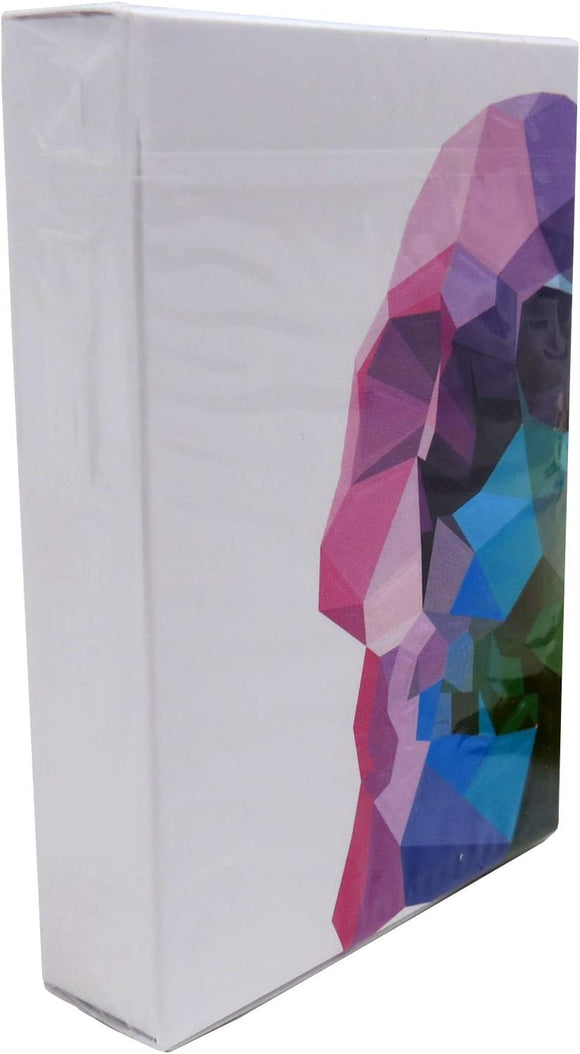 A box of Memento Mori Playing Cards by Murphy's Magic, showcasing a vibrant and colorful geometric design featuring a skull motif, symbolizing the theme of mortality and reflection. The box is neatly packaged, emphasizing its quality and aesthetic appeal.