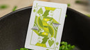 A close-up of the Jack of Spades playing card from the Sweet Peas Playing Cards set by OPC, featuring a vibrant green design and surrounded by fresh peas.