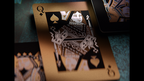 A close-up view of the Chakravyuh Playing Cards featuring gracefully designed playing cards with intricate artwork, highlighting the Queen of Spades. The cards are presented against a colorful background, showcasing their unique and artistic style.