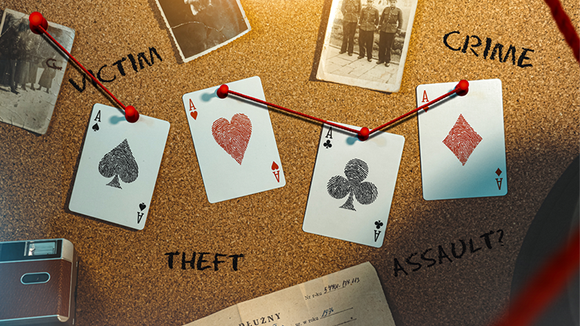 A close-up of CSI Playing Cards displayed on a corkboard, featuring four playing cards: Ace of Hearts, Ace of Spades, Ace of Diamonds, and Ace of Clubs. String connects these cards to words like 'Victim', 'Theft', 'Crime', and 'Assault?' alongside vintage photographs and notes, creating a detective's investigation theme.