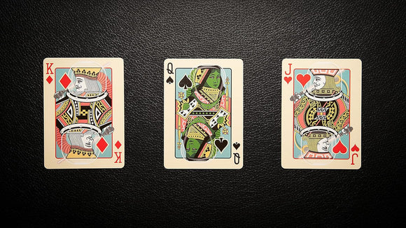 Ace Invaders Playing Cards featuring intricately designed King of Diamonds, Queen of Spades, and Jack of Hearts. The cards showcase vibrant illustrations, perfect for card games or collectors.
