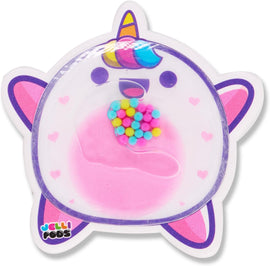 Jelli Pods Unicorn is a colorful fidget toy shaped like a playful unicorn with a vibrant mane. It features a squishy, pink gel core surrounded by small, multicolored beads for tactile engagement, ideal for sensory play. The unicorn design includes cute facial features and accents like hearts, making it visually appealing for users of all ages.