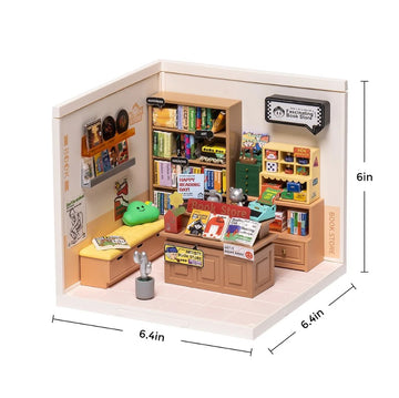 A detailed DIY miniature model of a book store by Robotime, featuring shelves filled with books, a cozy reading nook with a green cushion, and various accessories like a cash register, bookshelves, and display items. The scene captures a warm, inviting atmosphere perfect for book lovers.