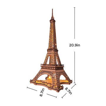 A detailed DIY kit of the Eiffel Tower by Robotime, featuring intricate wooden pieces that fit together to create a stunning 20.9-inch tall model. The tower showcases realistic architectural details and has dimensions of 8.7 inches in width and depth. Perfect for crafting enthusiasts and Eiffel Tower fans, this kit provides hands-on fun and a decorative piece.