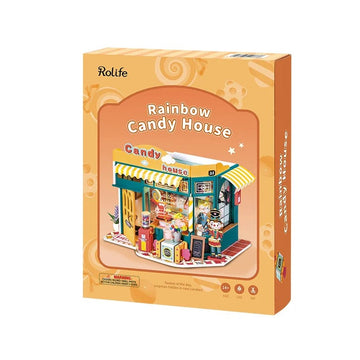 The Rainbow Candy House DIY kit by Robotime showcases an intricately designed candy shop. The vibrant box features a colorful storefront complete with charming details, such as decorative candy displays, a welcoming entrance, and playful characters, inviting creativity and fun. Perfect for enthusiasts of DIY projects, this kit provides a delightful way to assemble and create your very own miniature candy house.