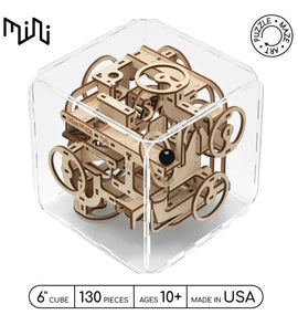 Intrism Mini, a 6-inch cube mechanical puzzle with 130 intricately designed wooden pieces. This engaging brain teaser is perfect for ages 10 and up, featuring a transparent box that showcases its maze-like structure. The puzzle emphasizes creativity and problem-solving skills, with a starting point and finish mark outlined on the pieces, allowing for an enjoyable hands-on experience.
