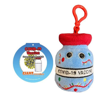 Colorful keychain featuring a soft, plush representation of a COVID-19 vaccine vial, complete with a red cap and cartoon eyes. Accompanied by a circular tag labeled 'COVID-19 Vaccine' and the Giantmicrobes logo, this item makes a fun and educational accessory.