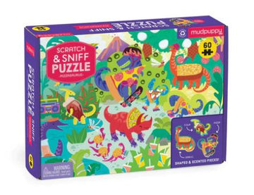 The Scratch and Sniff Pizzasaurus jigsaw puzzle by Mudpuppy features colorful dinosaur illustrations and scented pieces. The box is designed with vibrant artwork, showcasing a variety of playful dinosaurs in a lively scene. Ideal for kids, this 60-piece puzzle combines visually engaging elements with unique scratch-and-sniff technology to enhance the puzzle-solving experience.