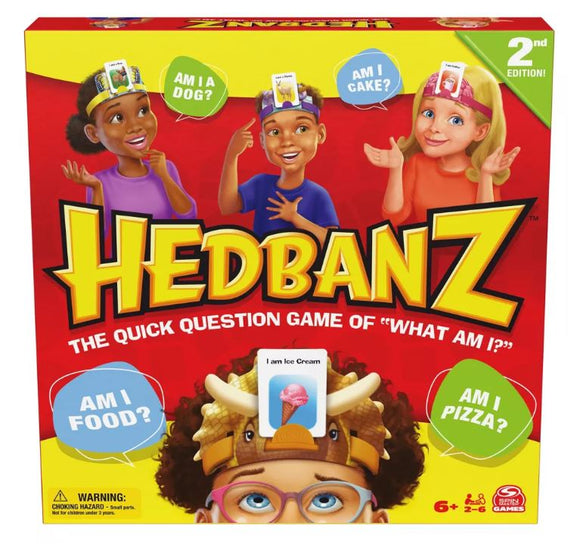 Hedbanz 2nd Edition game box featuring colorful graphics. The box shows children wearing headbands with question prompts like 'Am I a dog?' and 'Am I food?'. Exciting game for ages 6 and up, designed for 2 to 6 players, promoting fun and laughter.