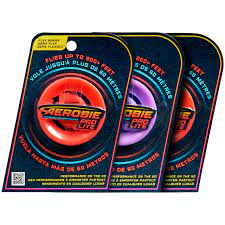 The Aerobie Pro Lite CDU Assorted by Spinmaster features three vibrant flying discs, designed for maximum distance and fun. Each disc is shown in a colorful package with bold branding, ideal for outdoor play.