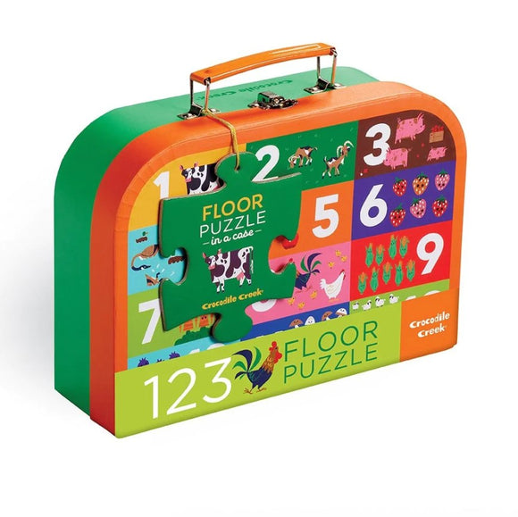 Barnyard 123 Floor Puzzle by Crocodile Creek, featuring vibrant illustrations of farm animals and numbers from 1 to 9. The puzzle comes in a sturdy case with a handle, making it perfect for storage and travel. Ideal for children to develop their counting and problem-solving skills while having fun.