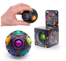The POP Puzzle Ball by One for Fun is a colorful mechanical puzzle designed to challenge the mind. A hand holds one of the colorful balls, showcasing its vibrant blue, green, purple, orange, and black colors. The product is presented next to its box, which features a playful logo and instructions for matching colors to solve the puzzle. Ideal for brain teasers and stress relief.