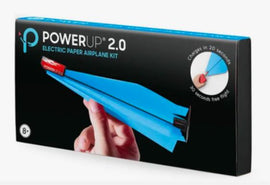 PowerUp 2.0 Electric Paper Airplane Kit by TAILOR TOYS. The kit features a blue electric paper airplane design with a charging indicator. It supports free flights lasting 30 seconds after a quick 20-second charge, ideal for kids aged 8 and up.