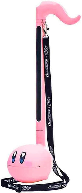 The Otamatone English Kirby Deluxe, a whimsical musical instrument shaped like a pink Kirby character with a long stem and a hanging strap. It features Kirby's signature eyes and a playful design, perfect for music enthusiasts and fans of the franchise.