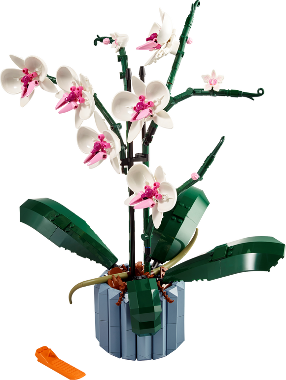 A detailed LEGO® Orchid kit featuring several vibrant white and pink orchid flowers mounted on green stems, surrounded by lush green leaves, all intricately arranged in a blue pot, showcasing the beauty of a lifelike plant creation made from colorful LEGO pieces.