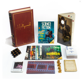 A collection of items themed around Hollywood 1947, including a red book titled "Hollywood 1947," a "Science Fiction" booklet, and several vintage-style movie posters. There are also small pieces with star symbols, a film strip, and various cards laid out on a white surface.