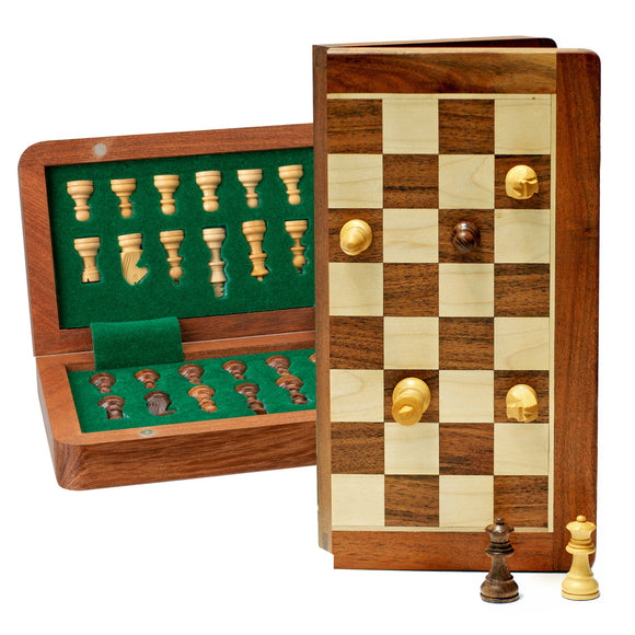 A beautifully crafted wooden chess set with a foldable magnetic board, featuring a checkered design and intricately carved pieces stored in a green felt-lined compartment. The compact design measures 7x9 inches, perfect for storage and travel.