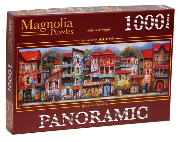 A boxed jigsaw puzzle titled 'OLD TBILISI - PANORAMIC' by Magnolia Puzzles. The box features a vibrant illustration of colorful buildings in Tbilisi, depicting intricate details and a charming, artistic style. The puzzle consists of 1000 pieces and has a five-star difficulty rating.