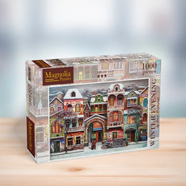 Magnolia Puzzles 'Winter Evening' jigsaw puzzle, featuring a charming winter scene with colorful buildings, trees, and figures. The box displays the title, number of pieces (1000), and difficulty level (4 stars).