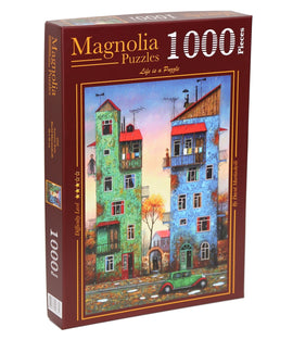 A jigsaw puzzle box titled 'AUTUMN RAIN' by Magnolia Puzzles. The box features a colorful illustration of vibrant buildings with trees in autumn tones, designed by Daniel Mondzinski. It contains 1000 pieces, marked with a difficulty rating of 'Easy'.