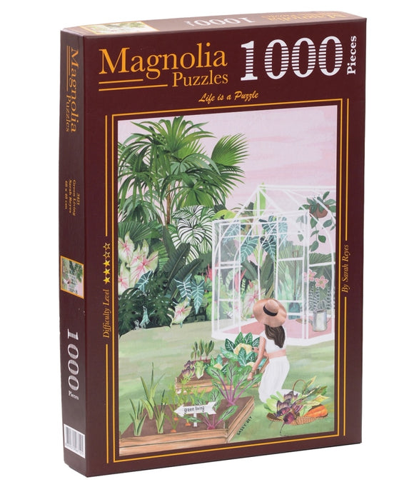 A jigsaw puzzle titled 'GREEN LIVING' by Magnolia Puzzles. The box features a colorful illustration of a woman tending to a lush garden, surrounded by various plants and a glass greenhouse. The puzzle contains 1000 pieces and emphasizes a vibrant, botanical theme.