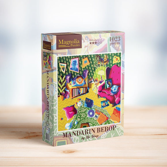 The MANDARIN BEBOP jigsaw puzzle by Magnolia Puzzles features a colorful interior scene filled with vibrant furniture, artwork, and decorative elements. The box showcases the puzzle's captivating 1023 piece design, inviting users to immerse themselves in a fun and engaging challenge while enhancing their spatial reasoning and problem-solving skills.