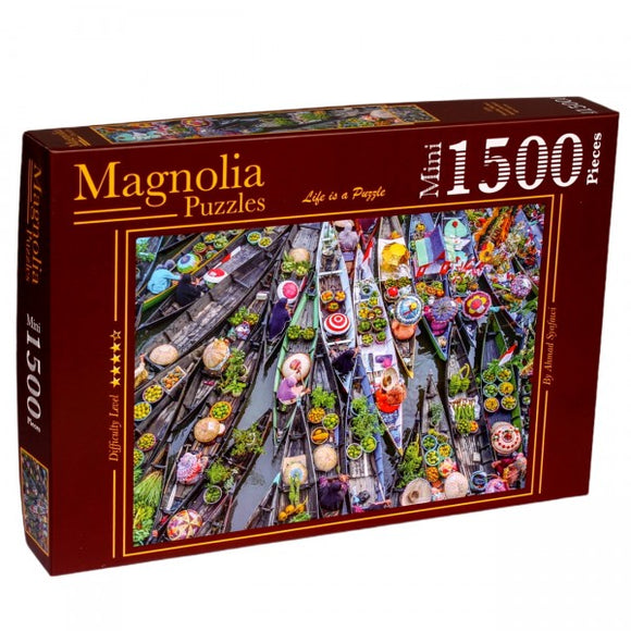 Magnolia Puzzles FLOATING MARKET jigsaw puzzle featuring a vibrant scene of a bustling floating market with colorful boats filled with fruits and vegetables. The puzzle contains 1500 pieces and has a difficulty rating of four stars, making it ideal for experienced puzzlers.