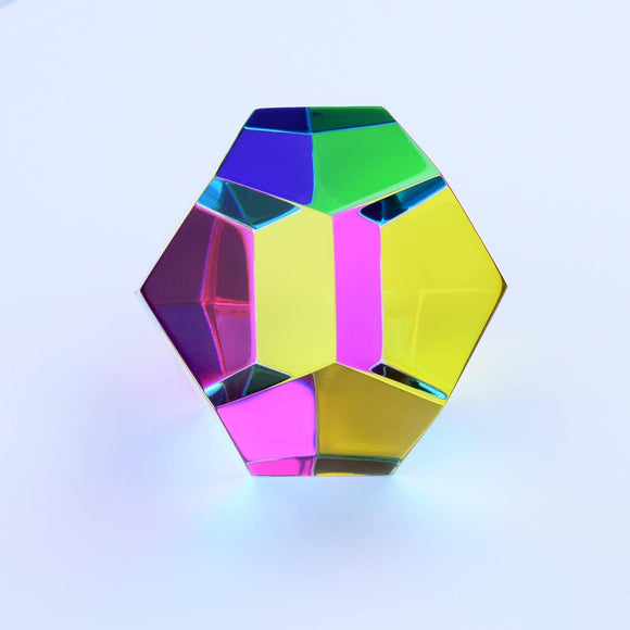The Mini Mundus by CMY Cubes is a colorful, geometric puzzle featuring vibrant, reflective surfaces in a hexagonal shape. This artistic piece sparks curiosity and creativity, perfect for tactile engagement and visual stimulation.