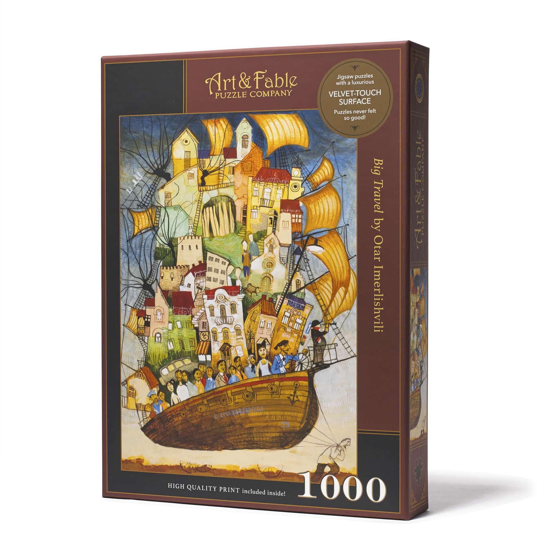 The Big Travel Velvet Touch jigsaw puzzle by Art & Fable Puzzle Co features a colorful and whimsical illustration capturing a ship filled with travelers and vibrant architecture. The box displays a 1000-piece puzzle with a luxurious velvet-touch surface, promising an enjoyable puzzle experience. A high-quality print is included within the package.