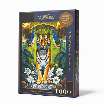 The Tale of Waghoba Velvet Puzzle by Art & Fable Puzzle Co features a stunning illustration of a tiger surrounded by peacocks and tropical leaves. The packaging highlights its luxurious velvet-touch surface and includes a high-quality print. This jigsaw puzzle consists of 1000 pieces, perfect for challenging puzzle enthusiasts and art lovers alike.