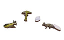 A collection of intricately designed wooden jigsaw puzzle pieces depicting various nature scenes, including a running fox, an acorn, and a mushroom. The pieces feature vibrant colors and unique shapes that highlight the artistry of the jigsaw puzzle.